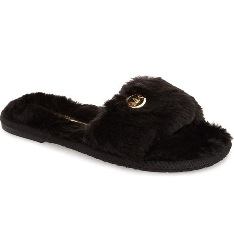 michael kors faux fur slippers.